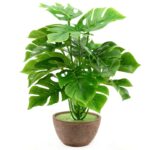 Grande plante artificielle feuille de pluie verte en pot.
