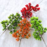 Branche de pin artificielle colorée en plastique