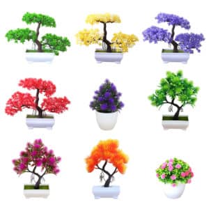 Plein de plantes artificielle bonsaï de différentes couleurs sur fond blanc